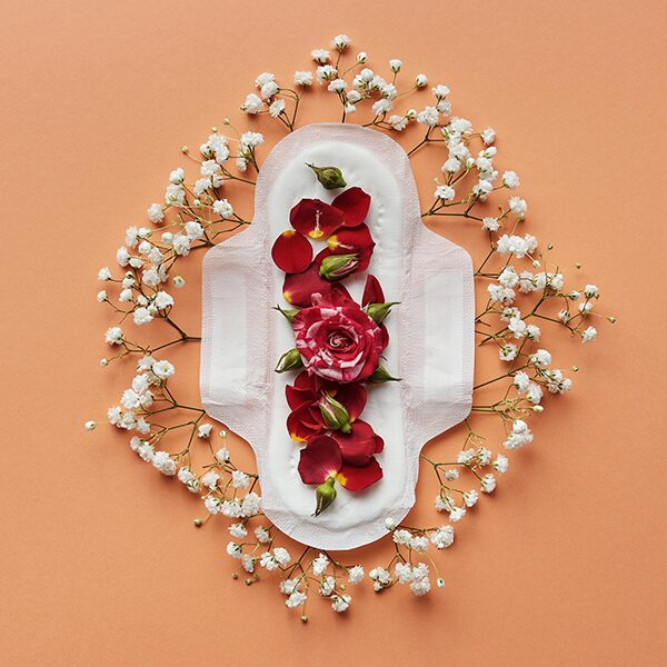 flowers placed on top of a disposable sanitary pad