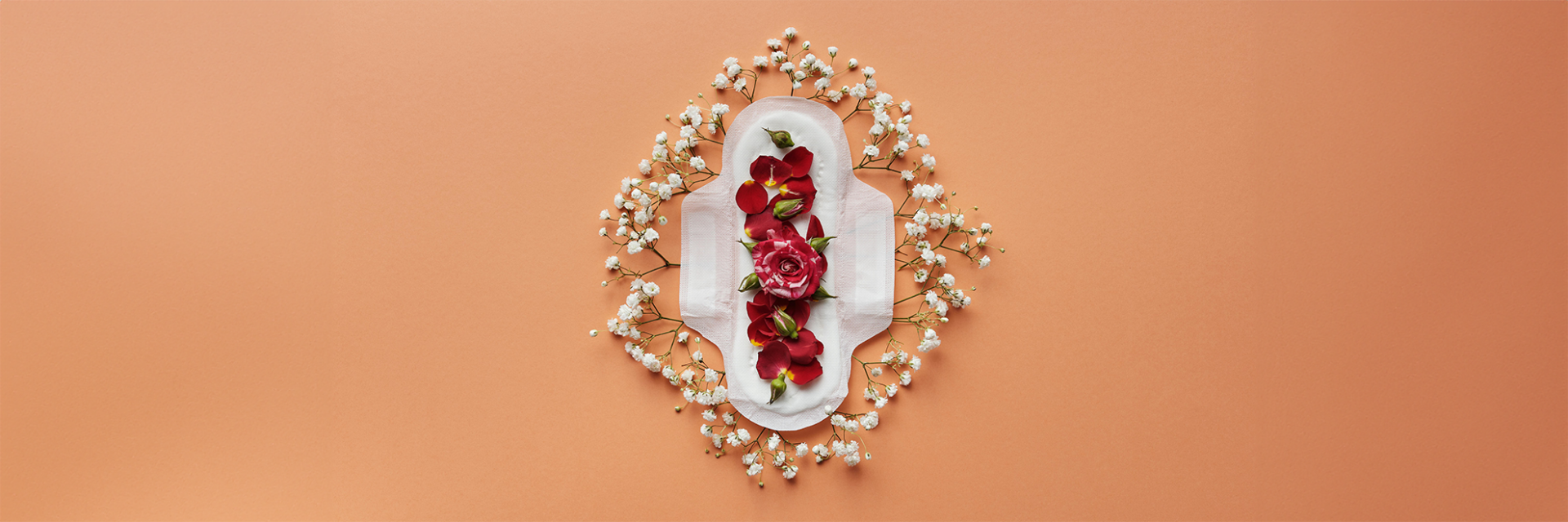 flowers placed on top of a disposable sanitary pad